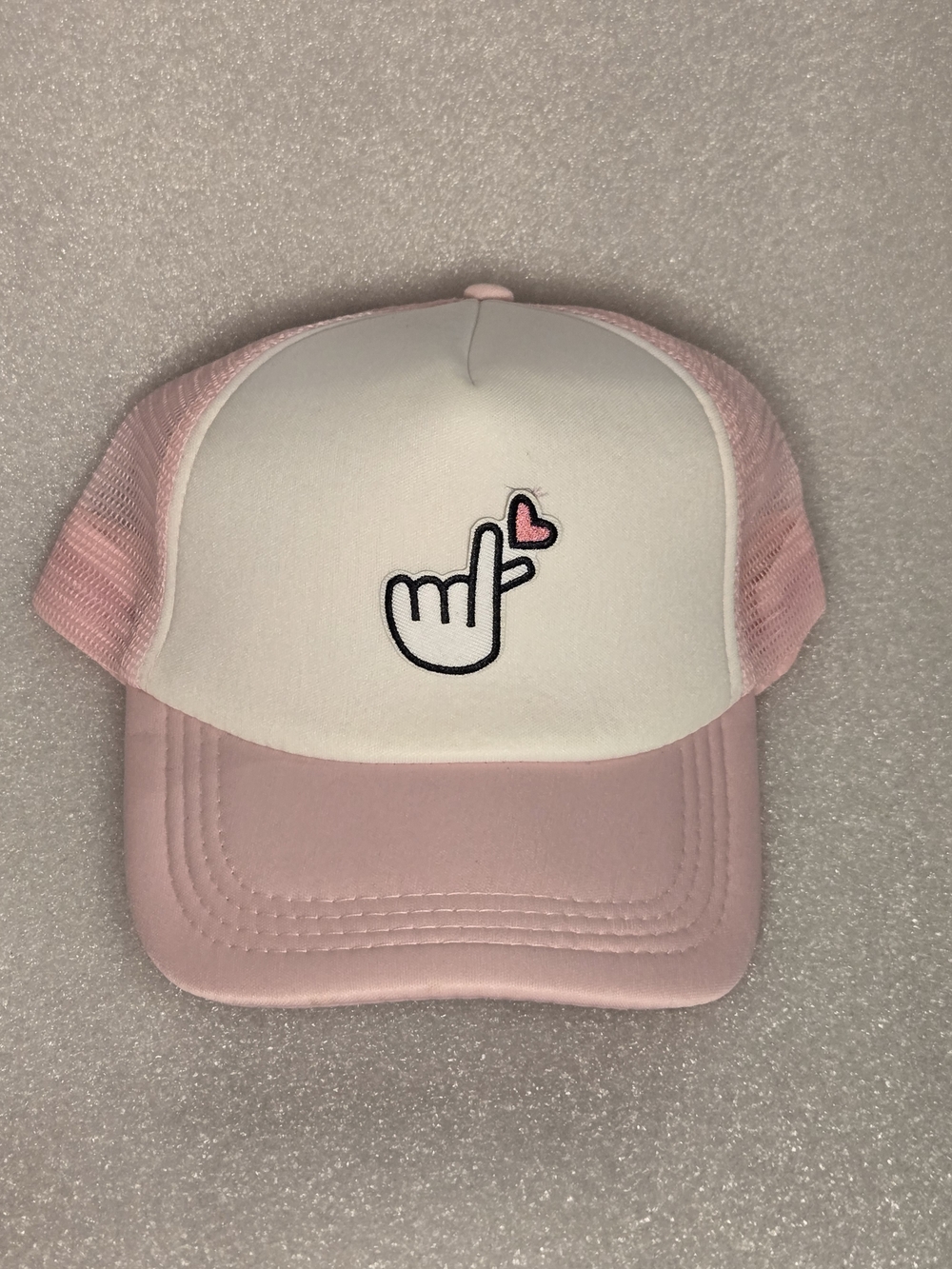 Unisex Pink & White Trucker Hat with Heart Finger Graphic